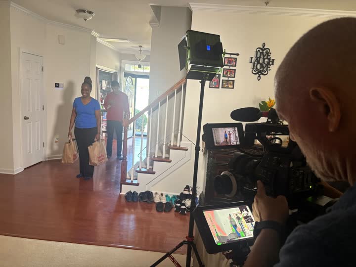 Camera operator and actress between setups